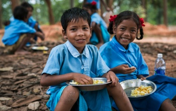 Children eating Mary's Meals in India