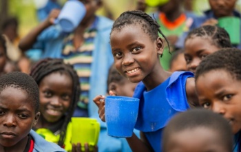 Children holding mugs