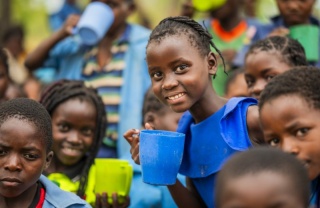 Children holding mugs