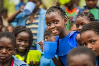 Children holding mugs