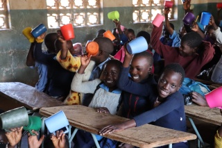 Childn Eating Marys Meal Food in a School